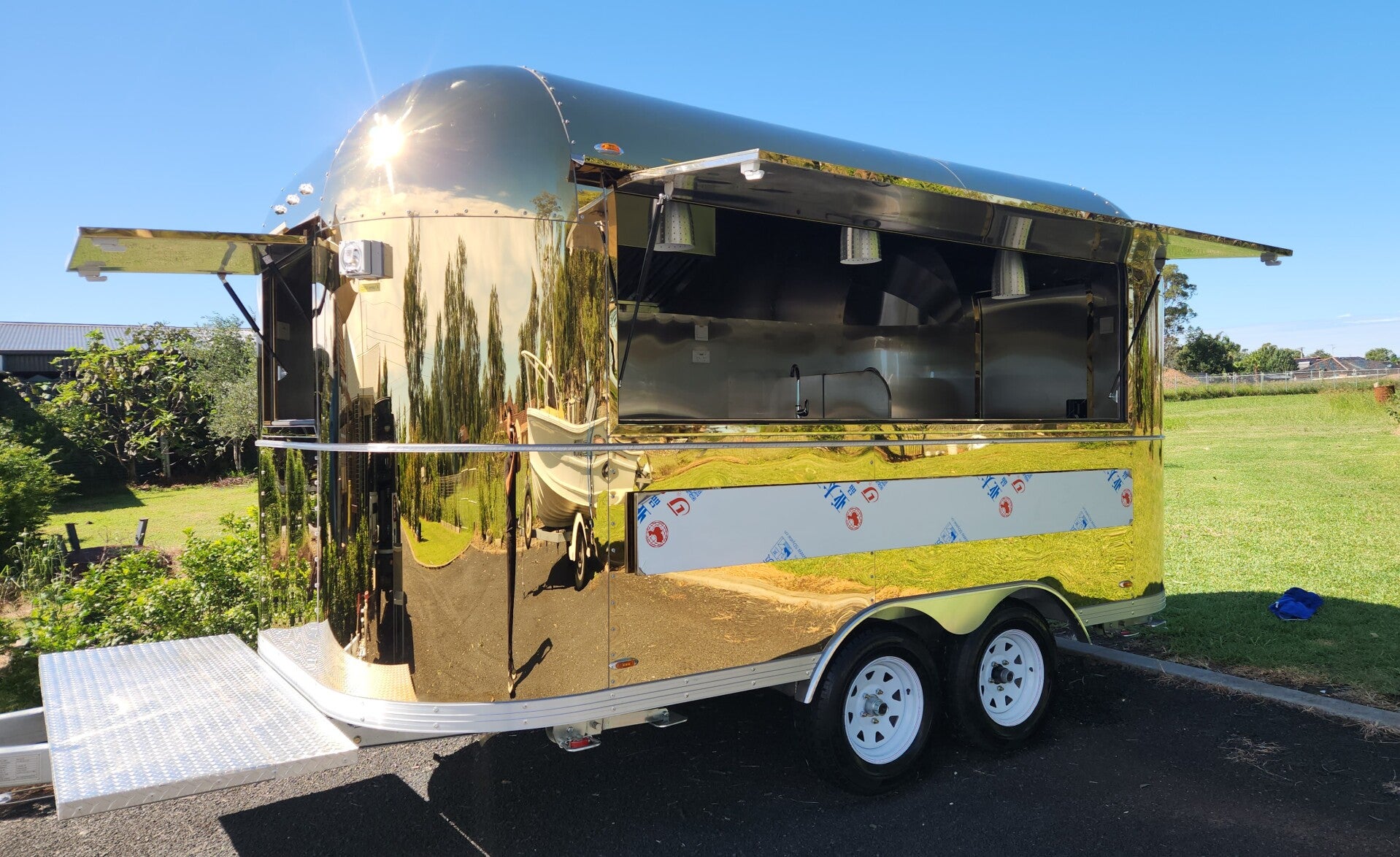 Gold mirror-finish Maxamus food trailer